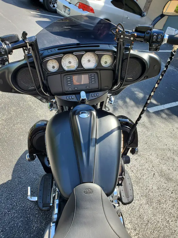Harley batwing inner fairing showing the two fairing speaker grilles, gauges and radio