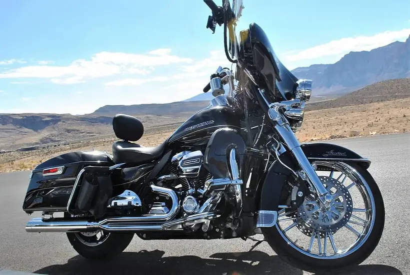 Black Harley Ultra Limited with a chrome front wheel
