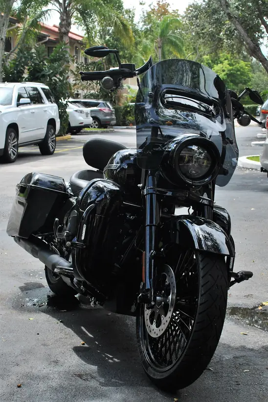 Blacked-out 2018 Harley Road King Special with a tinted windshield