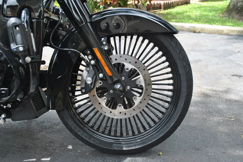 21 inch black spoke front wheel on a Harley Road King Special