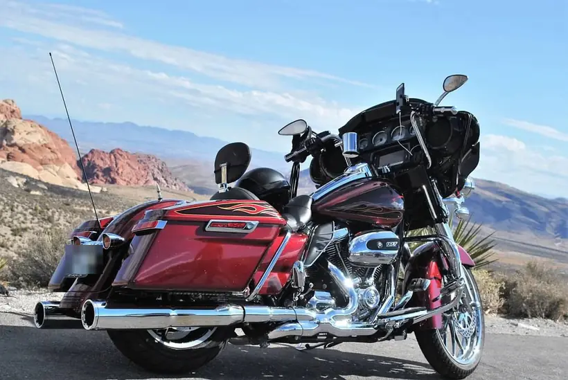 Red flamed 2017 Harley Street Glide Special parked on a desert road